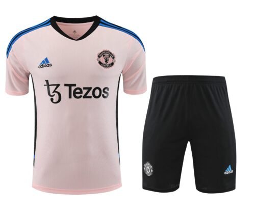 Conjunto de calentamiento Manchester United rosa claro