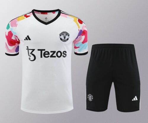 Conjunto de calentamiento Manchester United blanco mangas colores